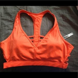 Neon orange sports bra